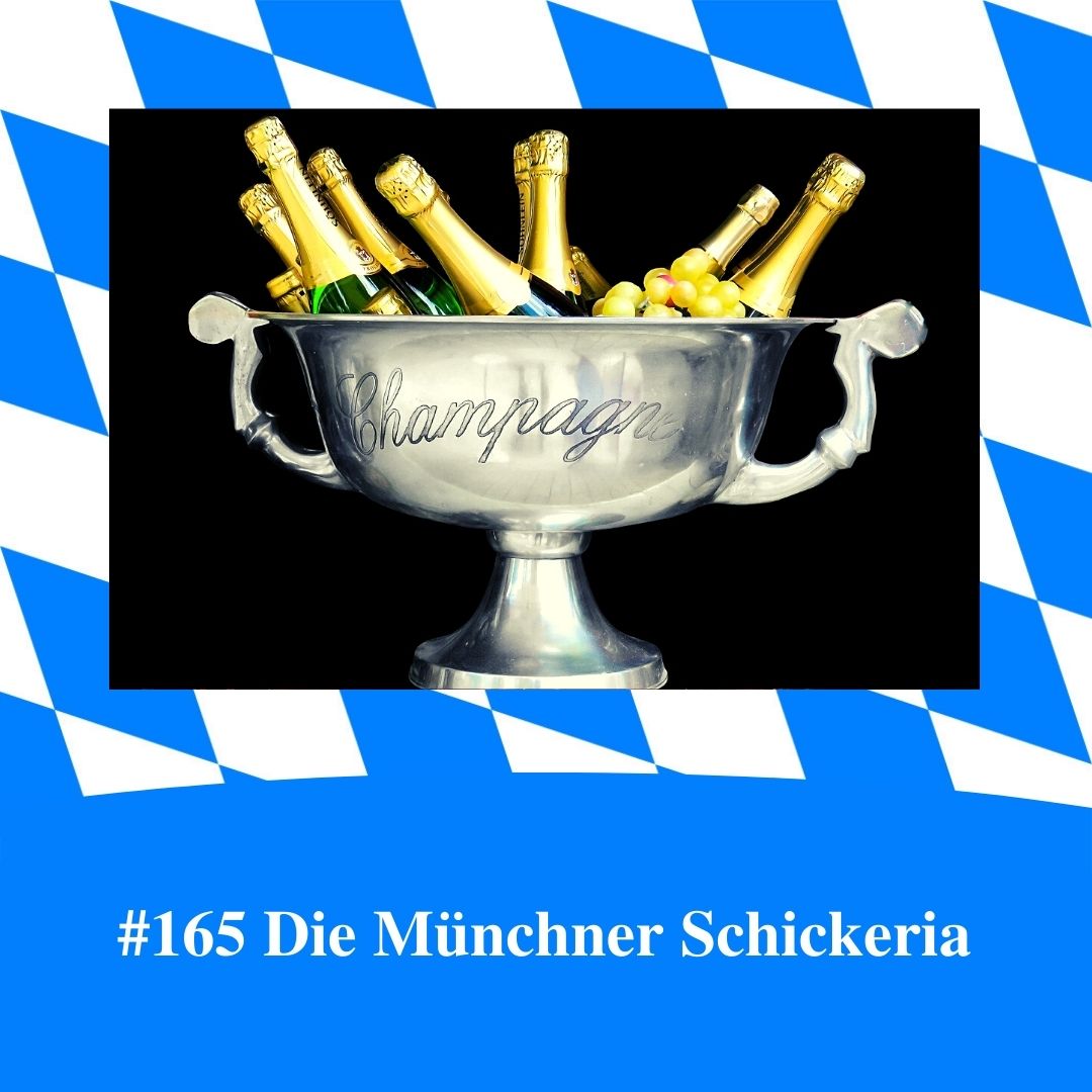 Bild für Folge Nummer 165 des bayerischen Podcasts Bayern Absolut. Ein Champagner-Kühler mit vielen Flaschen und Weintrauben. Das Bild ist umrahmt von weiß-blauen bayerischen Rauten.